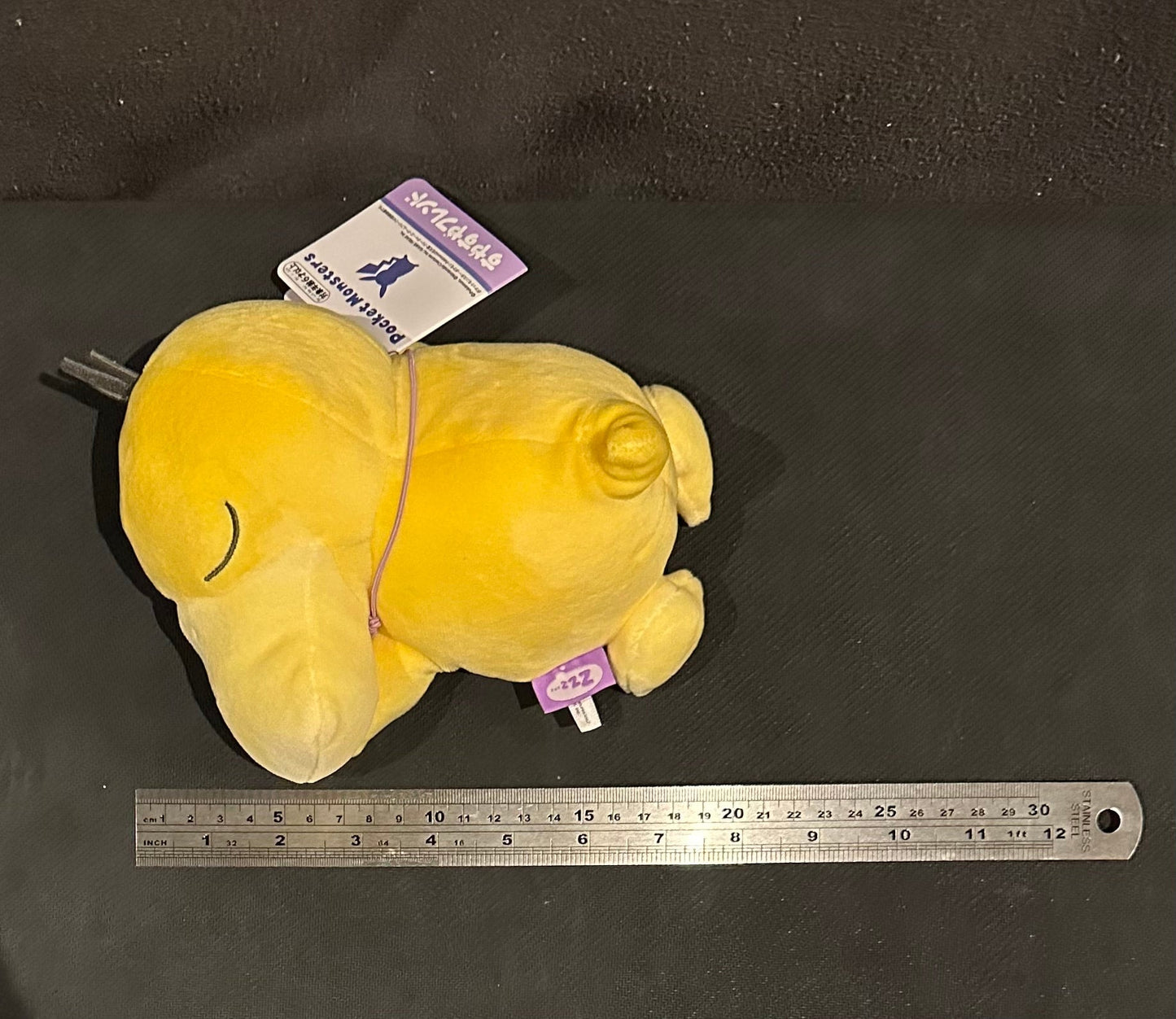 Psyduck (Pokémon Center) sleeping plush